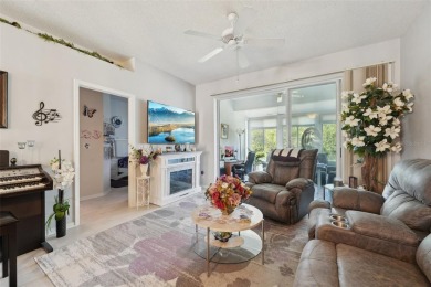 Welcome to this charming home nestled on a serene conservation on Scepter Golf Club in Florida - for sale on GolfHomes.com, golf home, golf lot