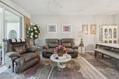 Welcome to this charming home nestled on a serene conservation on Scepter Golf Club in Florida - for sale on GolfHomes.com, golf home, golf lot