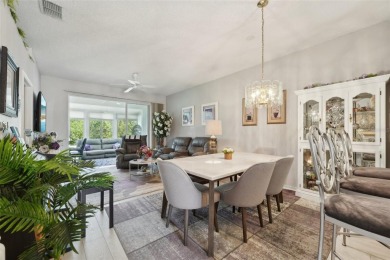 Welcome to this charming home nestled on a serene conservation on Scepter Golf Club in Florida - for sale on GolfHomes.com, golf home, golf lot