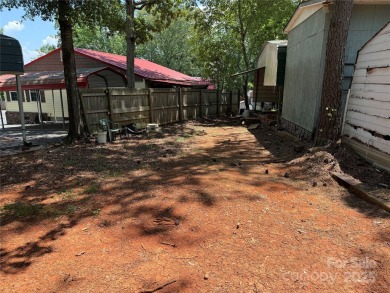 Are you looking for a Park Model and plenty of land as well. For on The Tillery Tradition Country Club in North Carolina - for sale on GolfHomes.com, golf home, golf lot