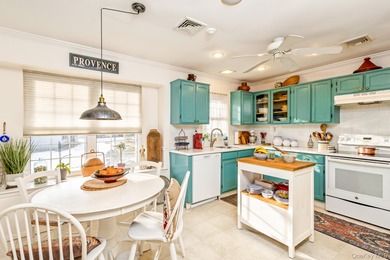 The Hampton model in Leisure Village of Ridge offers 1,400+ sq on Leisure Village Golf Course in New York - for sale on GolfHomes.com, golf home, golf lot