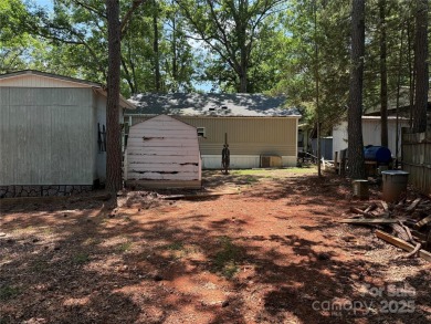 Are you looking for a Park Model and plenty of land as well. For on The Tillery Tradition Country Club in North Carolina - for sale on GolfHomes.com, golf home, golf lot