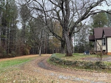 Great location in Granite Falls with no city taxes! This on Granada Farms Country Club in North Carolina - for sale on GolfHomes.com, golf home, golf lot