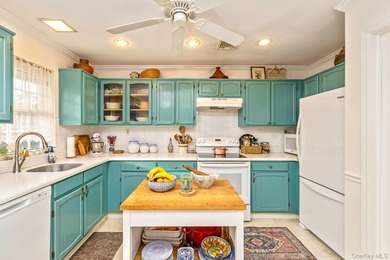 The Hampton model in Leisure Village of Ridge offers 1,400+ sq on Leisure Village Golf Course in New York - for sale on GolfHomes.com, golf home, golf lot