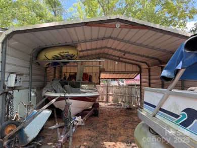 Are you looking for a Park Model and plenty of land as well. For on The Tillery Tradition Country Club in North Carolina - for sale on GolfHomes.com, golf home, golf lot
