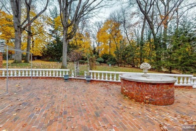 Georgian col. sits on a knoll overlooking Ramsey Golf/Club lake on Ramsey Golf and Country Club in New Jersey - for sale on GolfHomes.com, golf home, golf lot