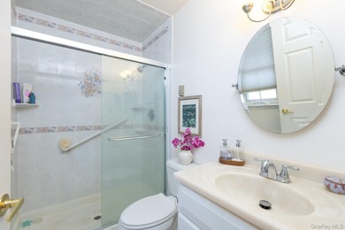 The Hampton model in Leisure Village of Ridge offers 1,400+ sq on Leisure Village Golf Course in New York - for sale on GolfHomes.com, golf home, golf lot