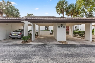 55+ FIRST FLOOR UNIT Come enjoy Escondido, the epitome of the on Tomoka Oaks Golf and Country Club in Florida - for sale on GolfHomes.com, golf home, golf lot