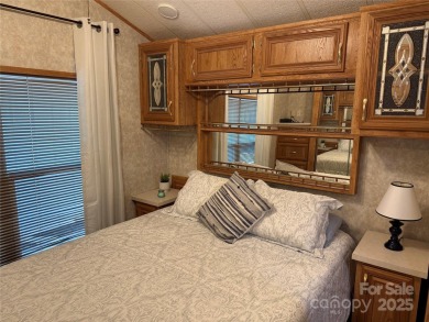 Are you looking for a Park Model and plenty of land as well. For on The Tillery Tradition Country Club in North Carolina - for sale on GolfHomes.com, golf home, golf lot