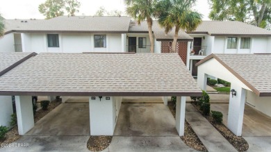 55+ FIRST FLOOR UNIT Come enjoy Escondido, the epitome of the on Tomoka Oaks Golf and Country Club in Florida - for sale on GolfHomes.com, golf home, golf lot