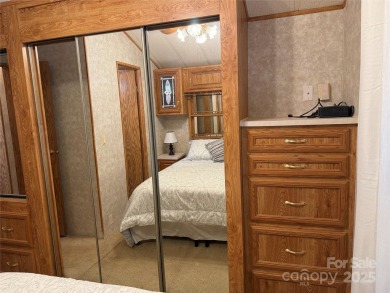 Are you looking for a Park Model and plenty of land as well. For on The Tillery Tradition Country Club in North Carolina - for sale on GolfHomes.com, golf home, golf lot