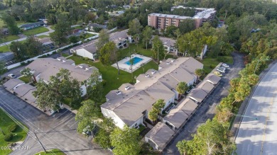 55+ FIRST FLOOR UNIT Come enjoy Escondido, the epitome of the on Tomoka Oaks Golf and Country Club in Florida - for sale on GolfHomes.com, golf home, golf lot