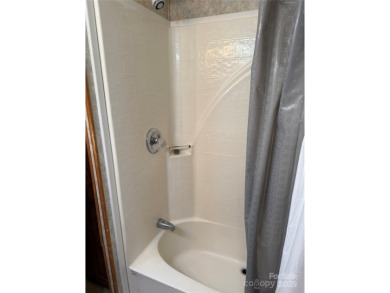 Are you looking for a Park Model and plenty of land as well. For on The Tillery Tradition Country Club in North Carolina - for sale on GolfHomes.com, golf home, golf lot