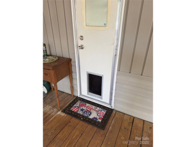 Are you looking for a Park Model and plenty of land as well. For on The Tillery Tradition Country Club in North Carolina - for sale on GolfHomes.com, golf home, golf lot