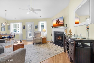 Light-filled, airy, and designed for easy coastal living, this on Harbour Point Golf Club in North Carolina - for sale on GolfHomes.com, golf home, golf lot