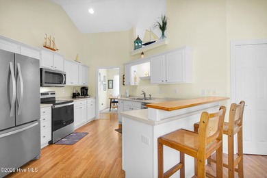 Light-filled, airy, and designed for easy coastal living, this on Harbour Point Golf Club in North Carolina - for sale on GolfHomes.com, golf home, golf lot