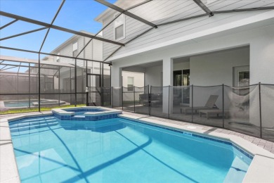 This professionally designed, fully furnished 7-bedroom, 5 on Highlands Reserve Golf Club in Florida - for sale on GolfHomes.com, golf home, golf lot