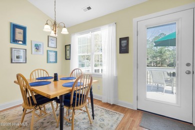 Light-filled, airy, and designed for easy coastal living, this on Harbour Point Golf Club in North Carolina - for sale on GolfHomes.com, golf home, golf lot