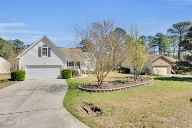 Light-filled, airy, and designed for easy coastal living, this on Harbour Point Golf Club in North Carolina - for sale on GolfHomes.com, golf home, golf lot