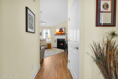 Light-filled, airy, and designed for easy coastal living, this on Harbour Point Golf Club in North Carolina - for sale on GolfHomes.com, golf home, golf lot