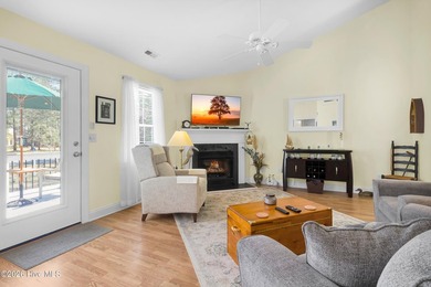 Light-filled, airy, and designed for easy coastal living, this on Harbour Point Golf Club in North Carolina - for sale on GolfHomes.com, golf home, golf lot