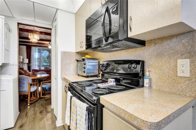 Experience Real South Florida Living in this spacious  2/2 condo on Jacaranda Golf Club in Florida - for sale on GolfHomes.com, golf home, golf lot