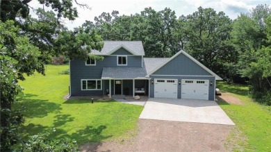 Welcome to this stunning custom-built home nestled in just steps on Pinewood Golf Course in Wisconsin - for sale on GolfHomes.com, golf home, golf lot