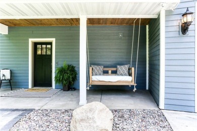 Welcome to this stunning custom-built home nestled in just steps on Pinewood Golf Course in Wisconsin - for sale on GolfHomes.com, golf home, golf lot