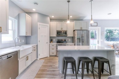 Welcome to this stunning custom-built home nestled in just steps on Pinewood Golf Course in Wisconsin - for sale on GolfHomes.com, golf home, golf lot