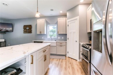 Welcome to this stunning custom-built home nestled in just steps on Pinewood Golf Course in Wisconsin - for sale on GolfHomes.com, golf home, golf lot