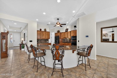 Stunning home, located within the gated Trilogy at Power Ranch on Trilogy Golf Club At Power Ranch in Arizona - for sale on GolfHomes.com, golf home, golf lot