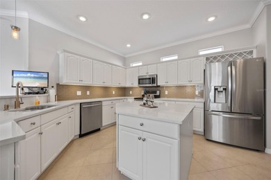 Imagine walking out your back door directly onto the golf course on The Groves Golf and Country Club in Florida - for sale on GolfHomes.com, golf home, golf lot