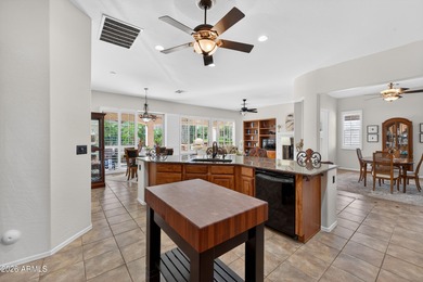 Stunning home, located within the gated Trilogy at Power Ranch on Trilogy Golf Club At Power Ranch in Arizona - for sale on GolfHomes.com, golf home, golf lot