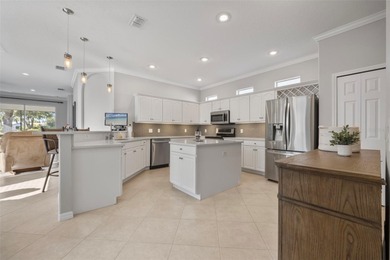 Imagine walking out your back door directly onto the golf course on The Groves Golf and Country Club in Florida - for sale on GolfHomes.com, golf home, golf lot