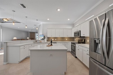 Imagine walking out your back door directly onto the golf course on The Groves Golf and Country Club in Florida - for sale on GolfHomes.com, golf home, golf lot