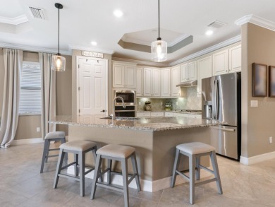 One or more photo(s) has been virtually staged. Live the Florida on Lakewood National Golf Club in Florida - for sale on GolfHomes.com, golf home, golf lot