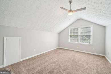 Welcome to this beautiful brick front home nestled on a sweeping on Hidden Hills Country Club in Georgia - for sale on GolfHomes.com, golf home, golf lot