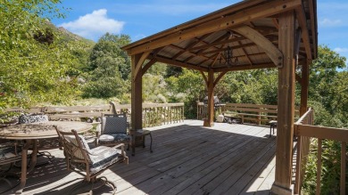This captivating home is nestled in a quiet cul de sac within a on Old Mill Golf Course in Utah - for sale on GolfHomes.com, golf home, golf lot