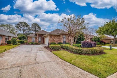 Located at 1456 Champions Green Drive in Gulf Breeze, Florida on Tiger Point Golf and Country Club in Florida - for sale on GolfHomes.com, golf home, golf lot
