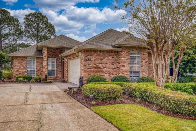 Located at 1456 Champions Green Drive in Gulf Breeze, Florida on Tiger Point Golf and Country Club in Florida - for sale on GolfHomes.com, golf home, golf lot