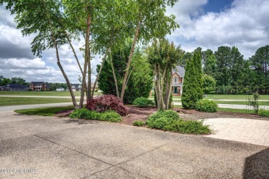 MUST SEE this WELL BUILT, WELL MAINTAINED Custom Brick home that on The Golf Club At Rocky Mount in North Carolina - for sale on GolfHomes.com, golf home, golf lot