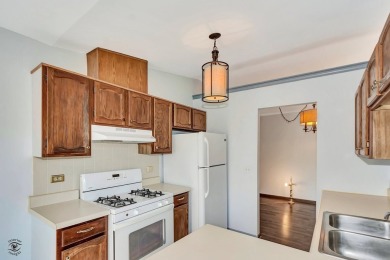 Your move-in ready 2nd floor, 2-bedroom, 2-bath condo is located on Green Meadows Golf Club in Illinois - for sale on GolfHomes.com, golf home, golf lot