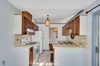 Your move-in ready 2nd floor, 2-bedroom, 2-bath condo is located on Green Meadows Golf Club in Illinois - for sale on GolfHomes.com, golf home, golf lot