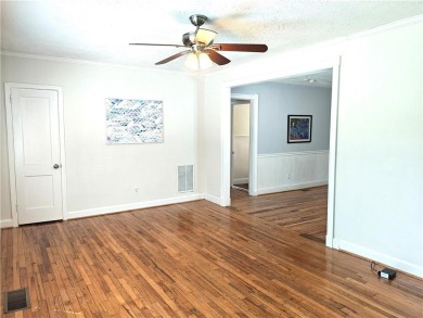 No HOA - Discover the perfect blend of contemporary elegance and on Charlie Yates Golf Course in Georgia - for sale on GolfHomes.com, golf home, golf lot