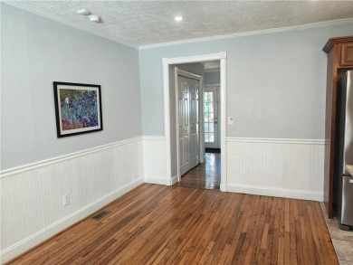 No HOA - Discover the perfect blend of contemporary elegance and on Charlie Yates Golf Course in Georgia - for sale on GolfHomes.com, golf home, golf lot