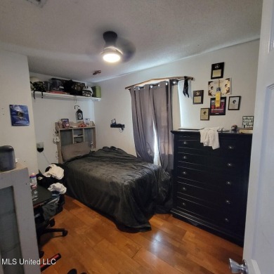 Discover this 3-bedroom, 2-bathroom home nestled right on the on Pass Christian Isles Golf Club in Mississippi - for sale on GolfHomes.com, golf home, golf lot