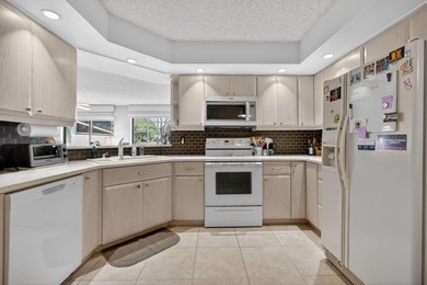 Resort style living at PGA National in well maintained on PGA National Golf Club in Florida - for sale on GolfHomes.com, golf home, golf lot