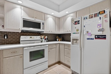 Resort style living at PGA National in well maintained on PGA National Golf Club in Florida - for sale on GolfHomes.com, golf home, golf lot