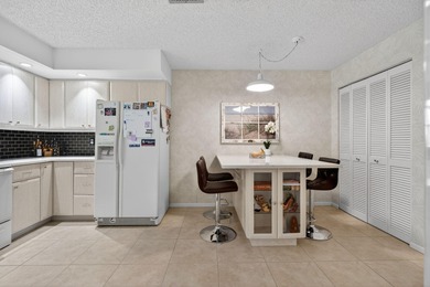 Resort style living at PGA National in well maintained on PGA National Golf Club in Florida - for sale on GolfHomes.com, golf home, golf lot