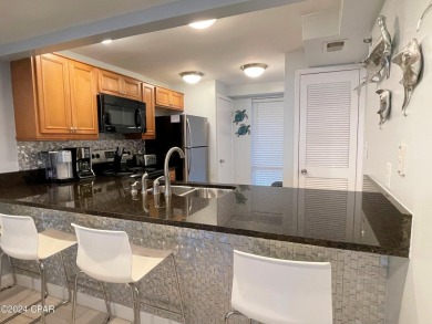 Some seller financing available on this condo // Discover the on Edgewater Beach Resort in Florida - for sale on GolfHomes.com, golf home, golf lot